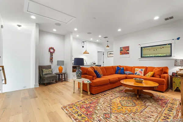a living room with furniture and a couch