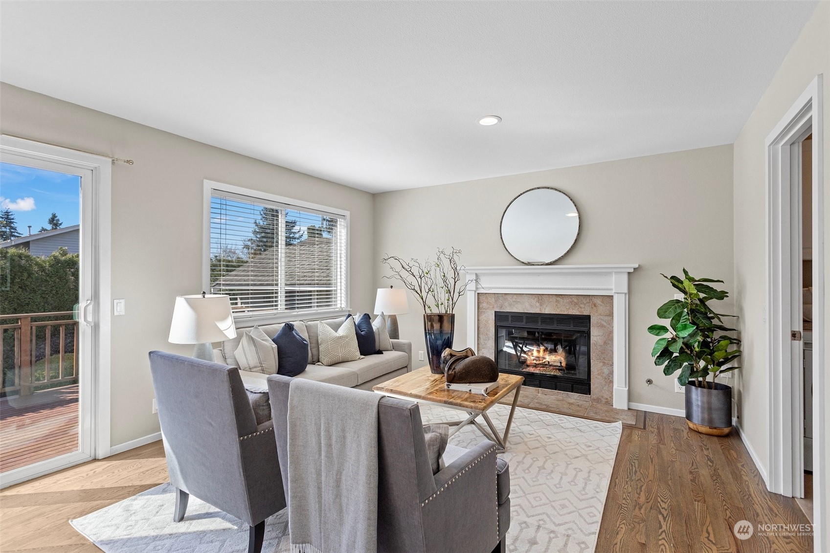 112 236th Place Southwest Bothell, WA 98021 - Photo 12 of 40 a living room with furniture and a fireplace