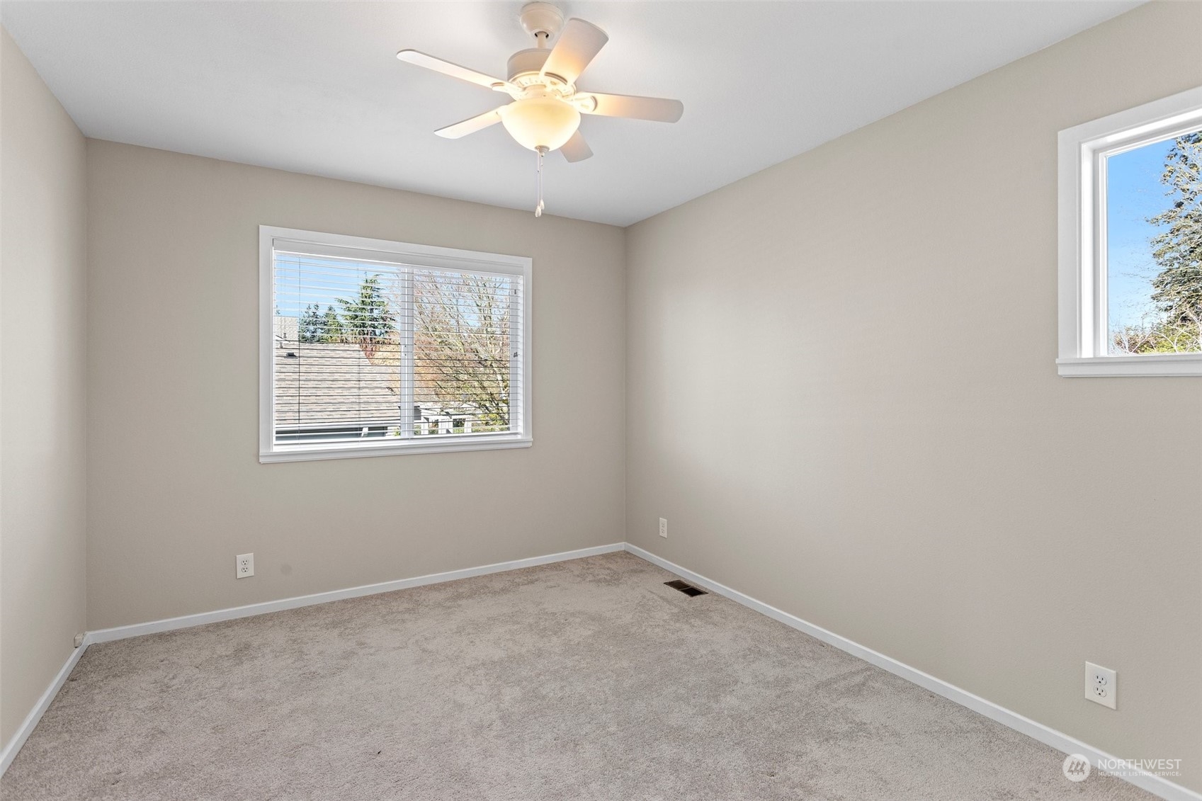112 236th Place Southwest Bothell, WA 98021 - Photo 20 of 40 an empty room with windows and fan