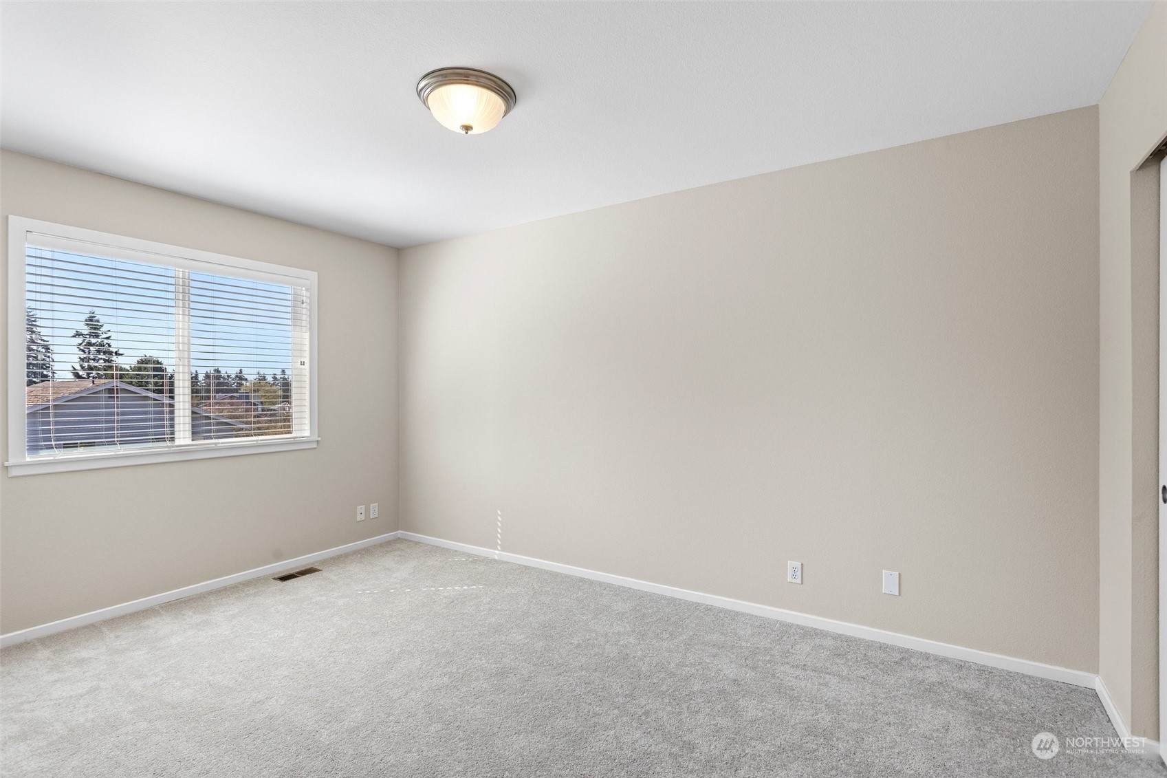 112 236th Place Southwest Bothell, WA 98021 - Photo 21 of 40 an empty room with windows