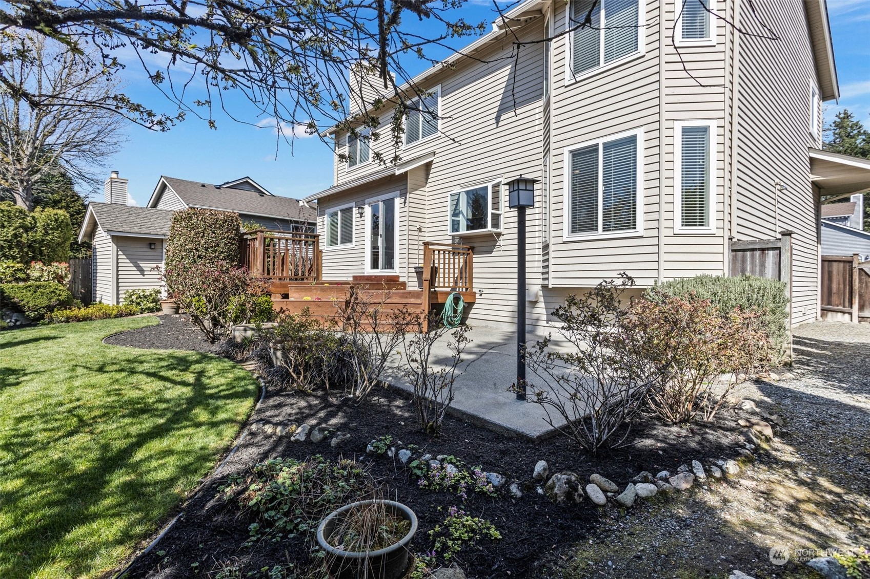 112 236th Place Southwest Bothell, WA 98021 - Photo 32 of 40 a view of a house with yard and sitting area