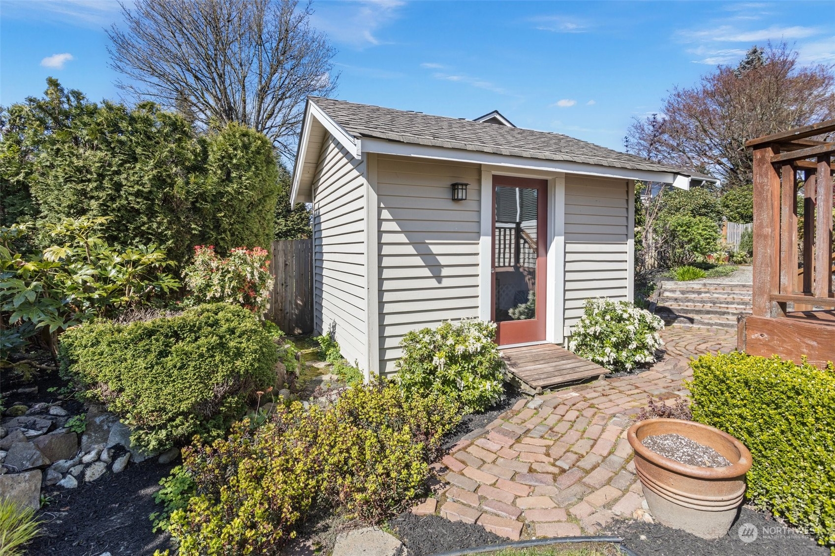 112 236th Place Southwest Bothell, WA 98021 - Photo 35 of 40 a view of a house with potted plants