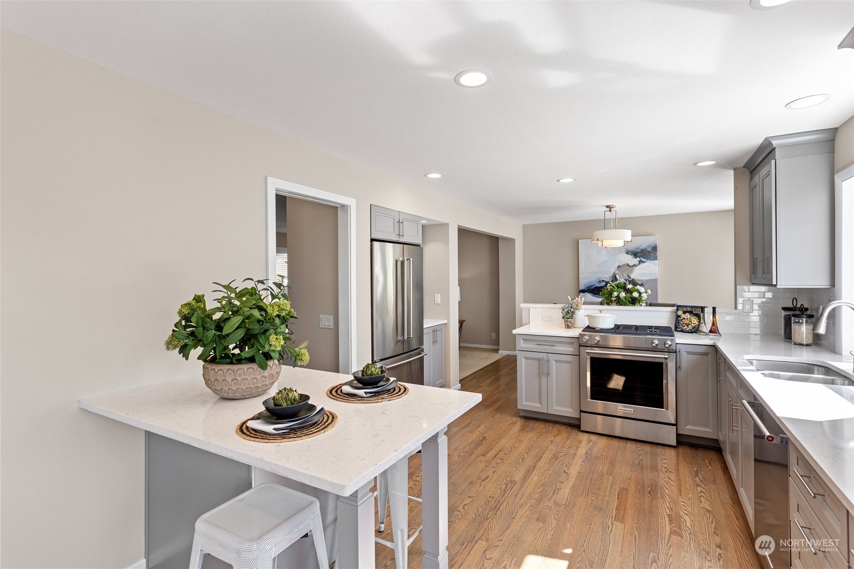 112 236th Place Southwest Bothell, WA 98021 - Photo 10 of 40 a kitchen with a sink and stove top oven