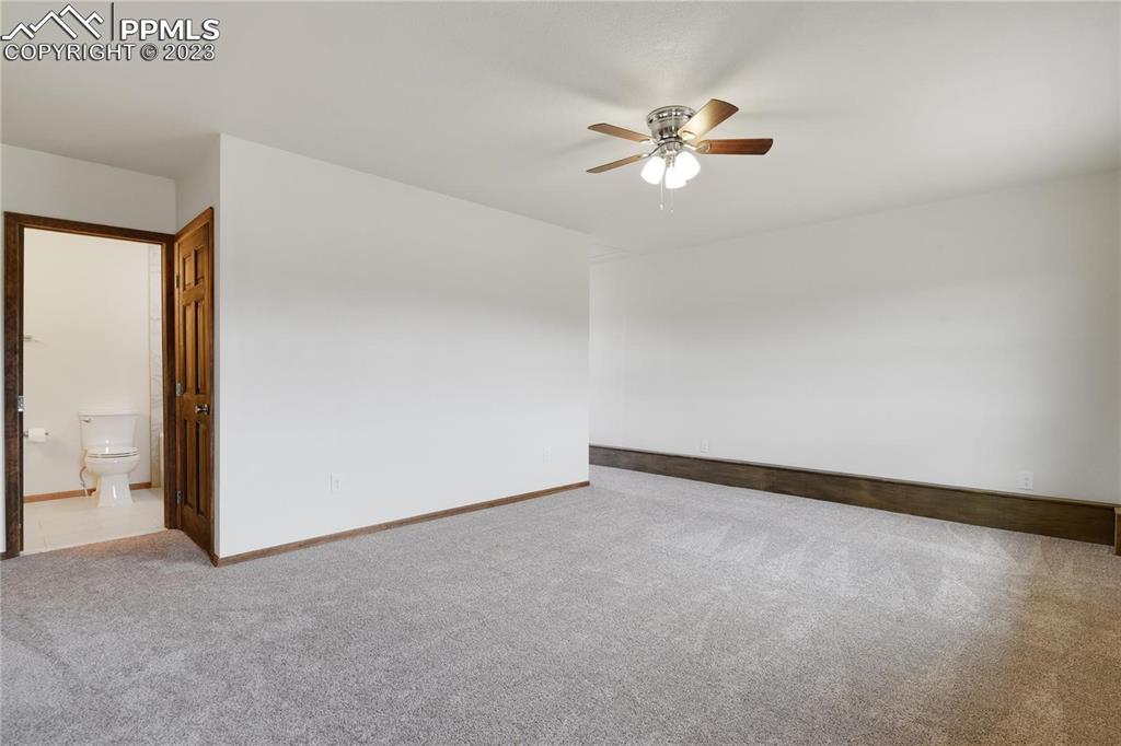 13771 South Hedi Road Sedalia, CO 80135 - Photo 25 of 49 a view of an empty room with a window