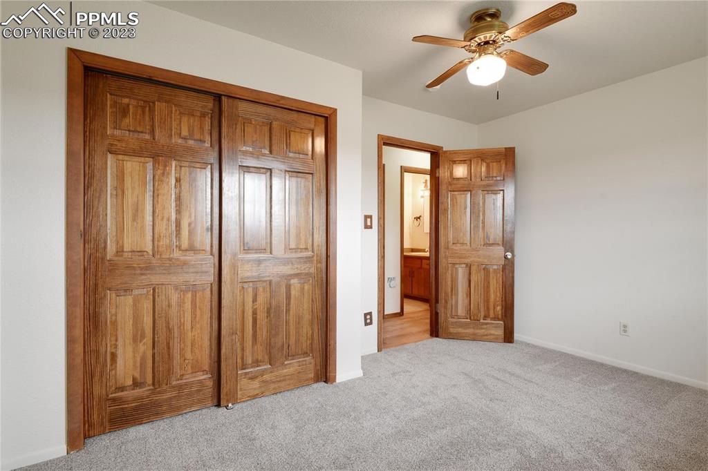 13771 South Hedi Road Sedalia, CO 80135 - Photo 29 of 49 a view of an empty room with a window