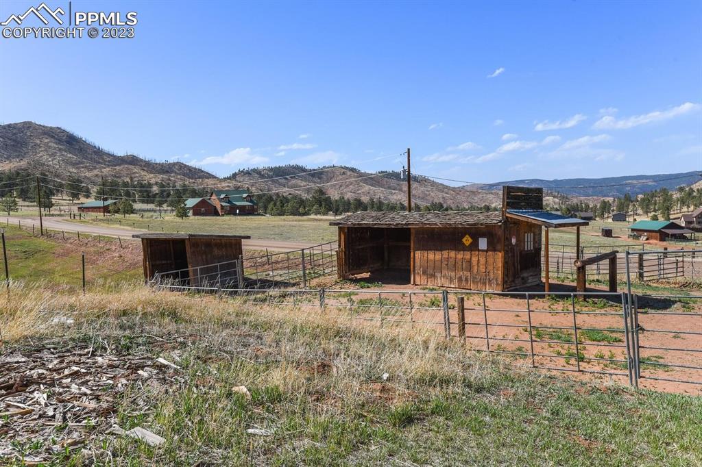 13771 South Hedi Road Sedalia, CO 80135 - Photo 39 of 49 a view of a terrace with a table and chairs