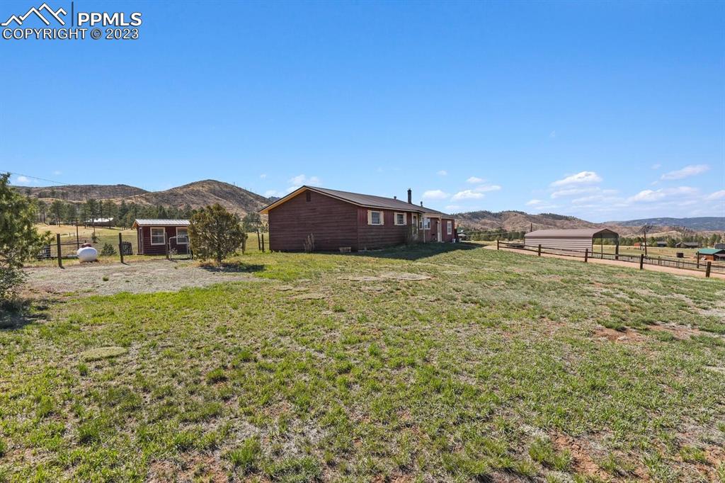 13771 South Hedi Road Sedalia, CO 80135 - Photo 43 of 49 a view of a town with residential houses