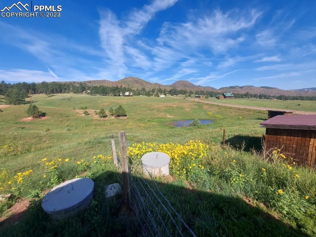 13771 South Hedi Road Sedalia, CO 80135 - Photo 48 of 49 a view of lake with mountain view