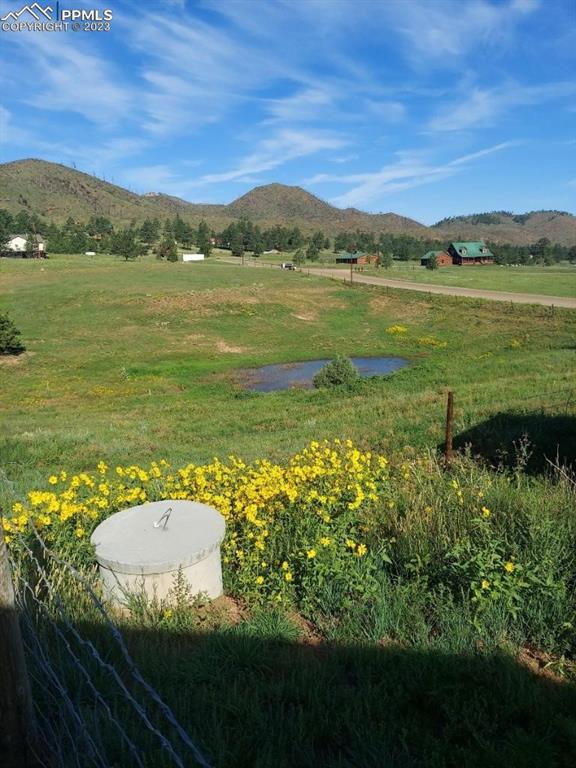13771 South Hedi Road Sedalia, CO 80135 - Photo 49 of 49 a view of a lake with a mountain