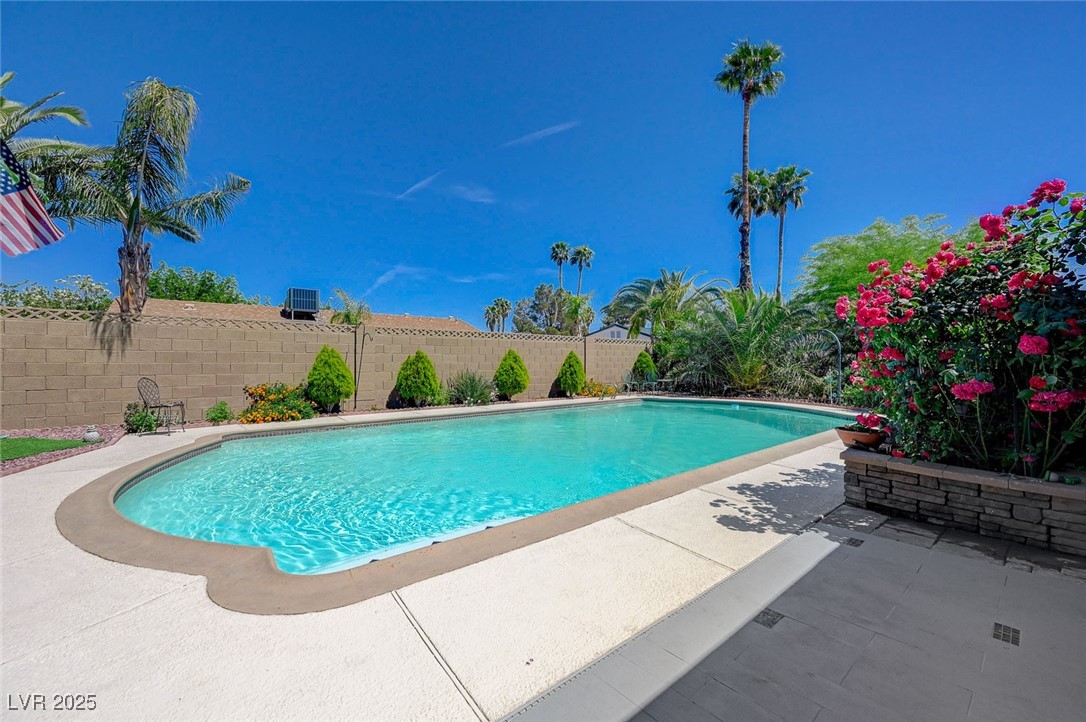 3266 Mountain Spring Road Las Vegas, NV 89146 - Photo 43 of 49 View of pool featuring a patio area, a fenced in pool, and a fenced backyard