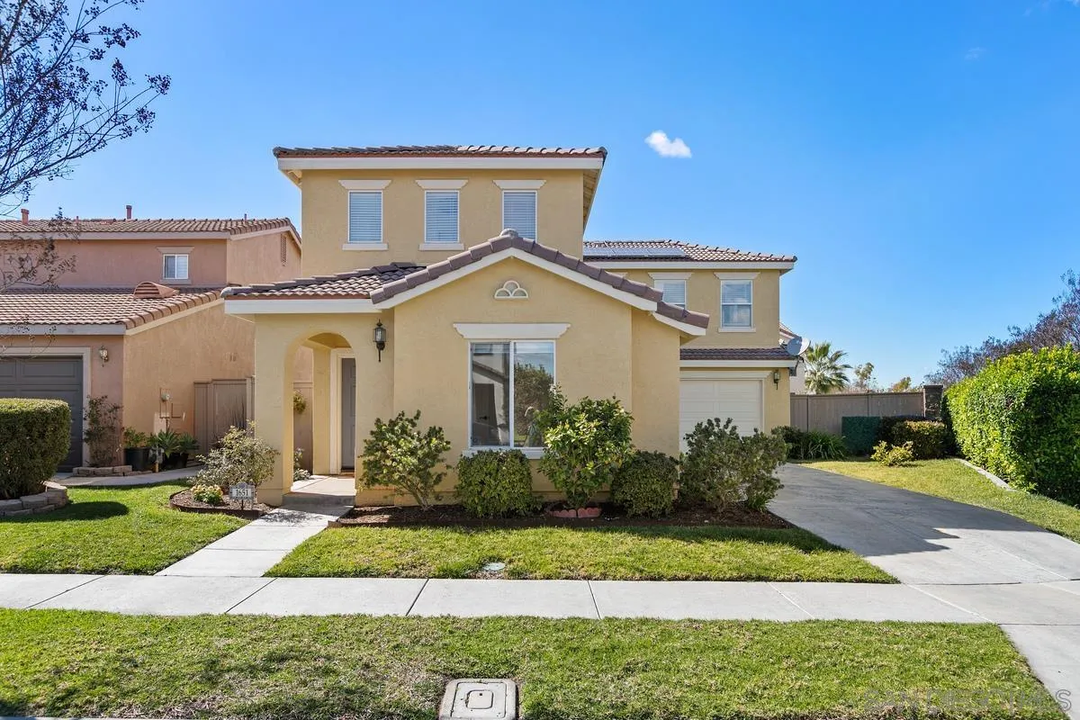 1651 Applegate Street Chula Vista, CA 91913 - Photo 2 of 20 a front view of a house with garden