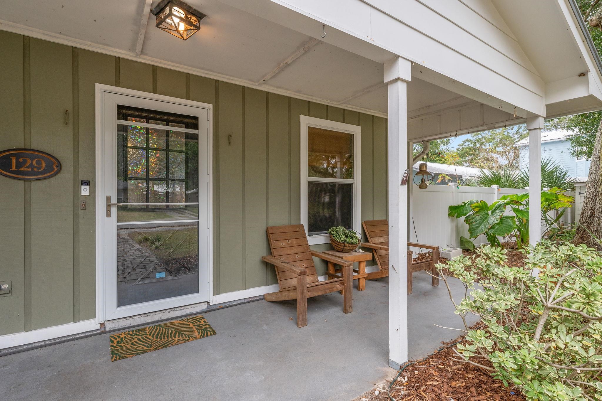 129 Pelican Road St. Augustine, FL 32086 - Photo 4 of 35 a building outdoor space with patio furniture and potted plants