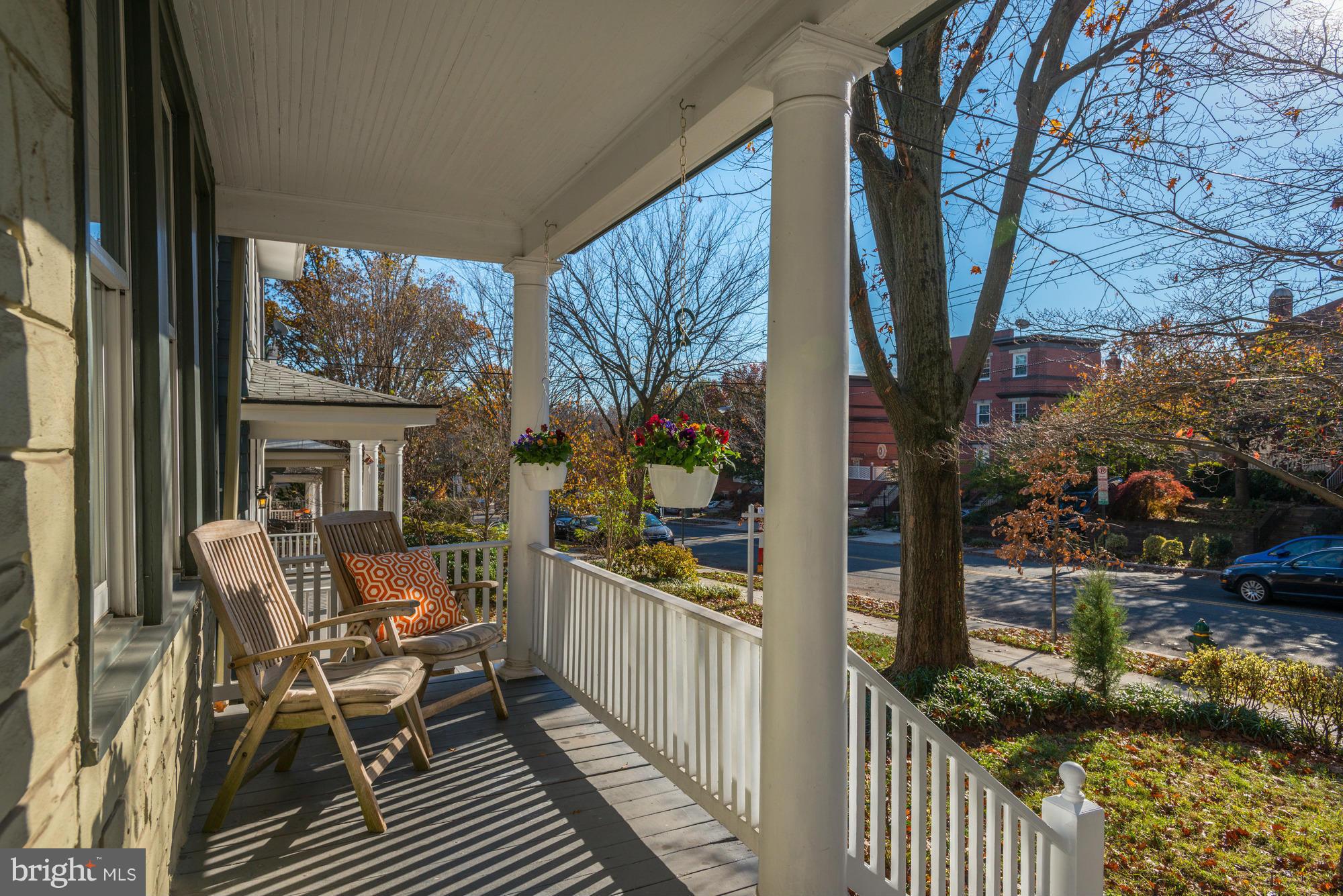 1419 Foxhall Road Northwest Washington, DC 20007 - Photo 2 of 19 a view of a balcony with chairs