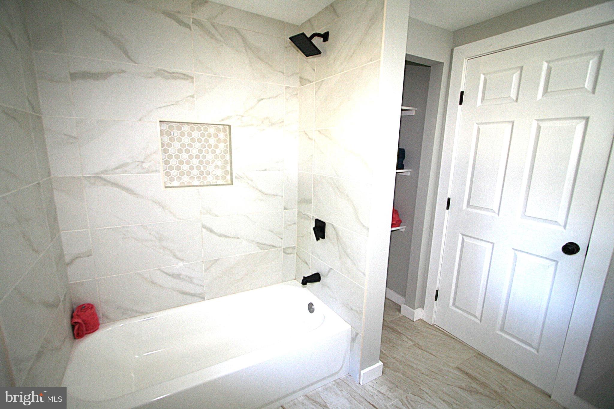 111 Utah Road Stevensville, MD 21666 - Photo 22 of 45 Hall Bath with Shelves for Linens