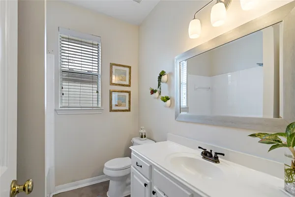 a bathroom with a sink and a toilet