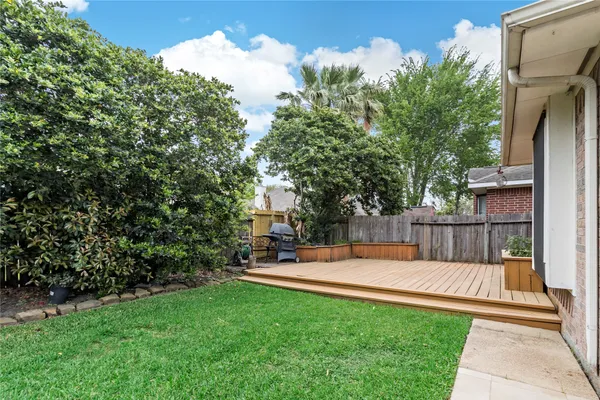 a view of swimming pool with a patio