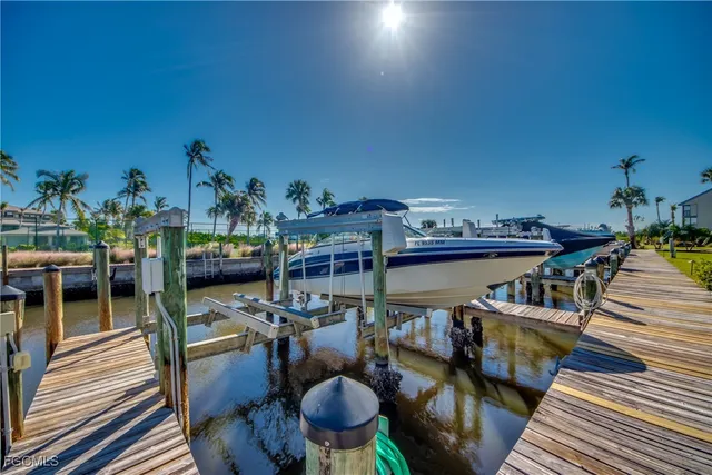 a view of a chairs and table in patio