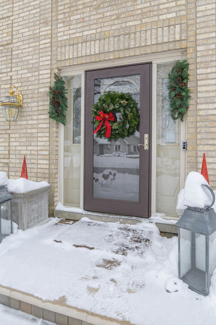 1995 Salem Road Elgin, IL 60123 - Photo 2 of 29 a front view of a house with outdoor seating