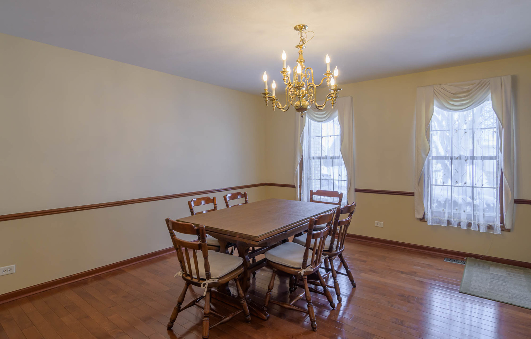 1995 Salem Road Elgin, IL 60123 - Photo 6 of 29 a view of a dining room with furniture and chandelier