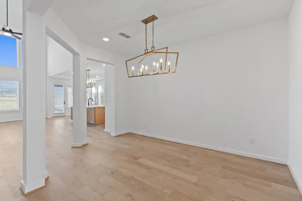 a view of a kitchen with a sink and a window
