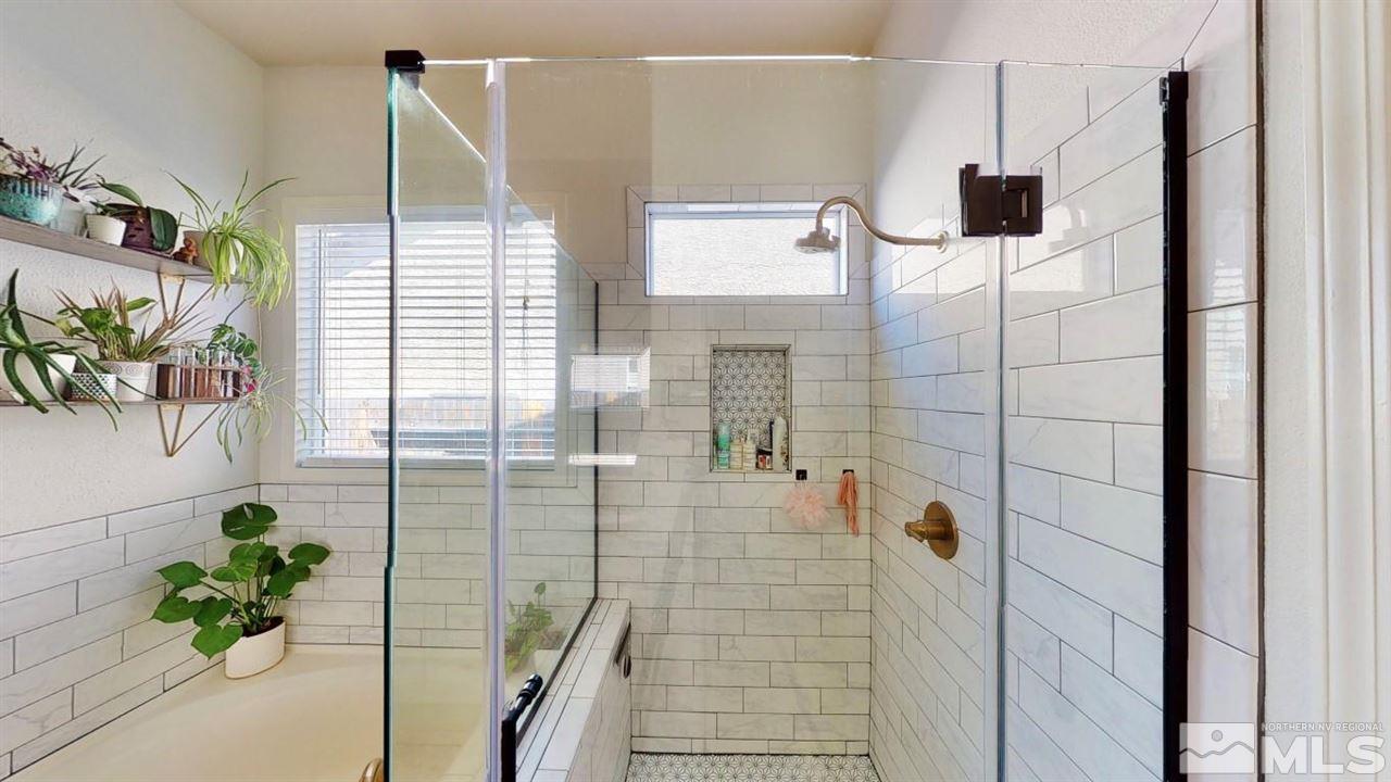 10621 Copper Moon Court Reno, NV 89521 - Photo 27 of 33 a bathroom with a shower