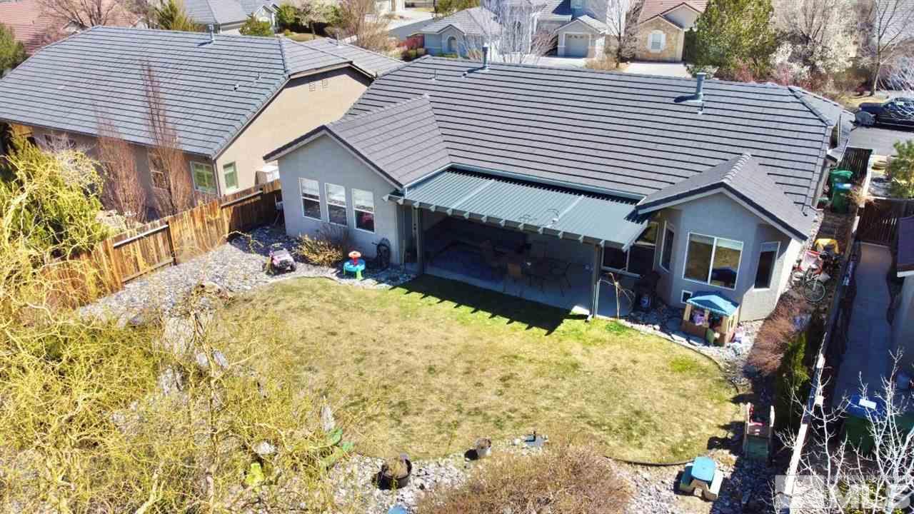 10621 Copper Moon Court Reno, NV 89521 - Photo 31 of 33 a view of house with yard