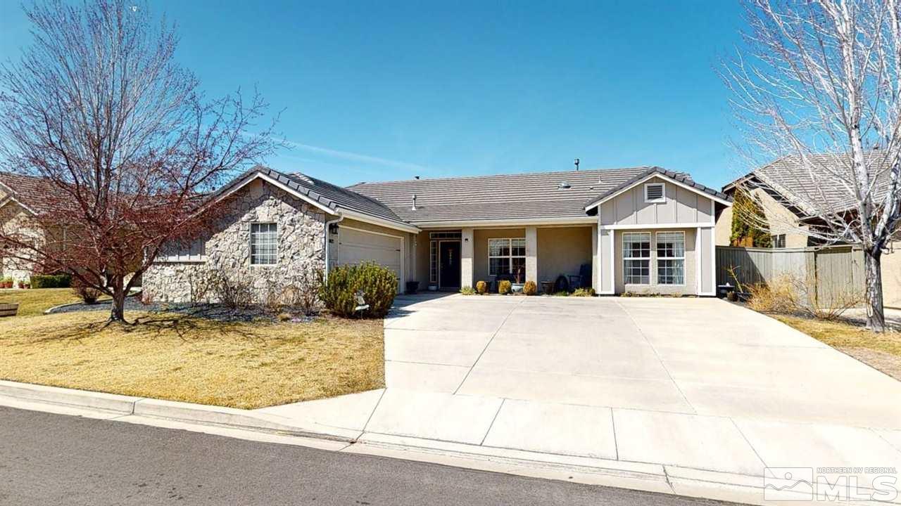 10621 Copper Moon Court Reno, NV 89521 - Photo 33 of 33 a view of house with yard & tree in front of it