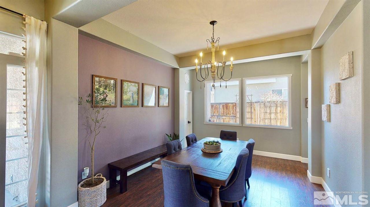 10621 Copper Moon Court Reno, NV 89521 - Photo 5 of 33 a view of a dining room with furniture and wooden floor