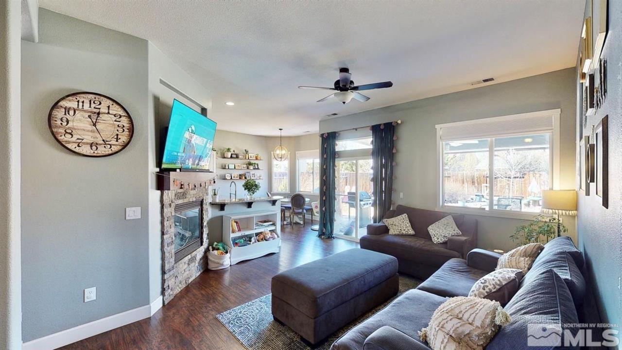 10621 Copper Moon Court Reno, NV 89521 - Photo 8 of 33 a living room with furniture and a large window