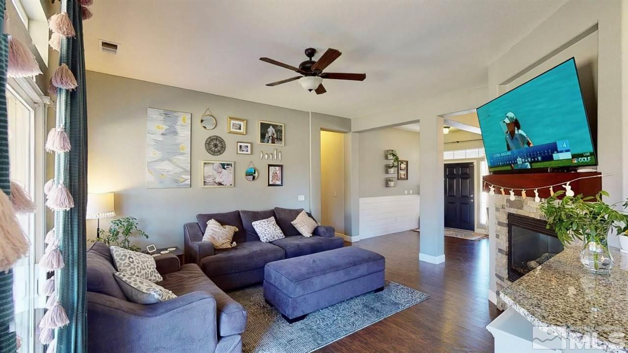 10621 Copper Moon Court Reno, NV 89521 - Photo 10 of 33 a living room with furniture and a large window