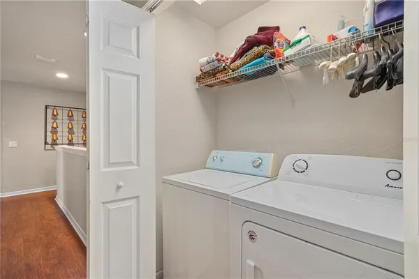 a utility room with dryer and washer