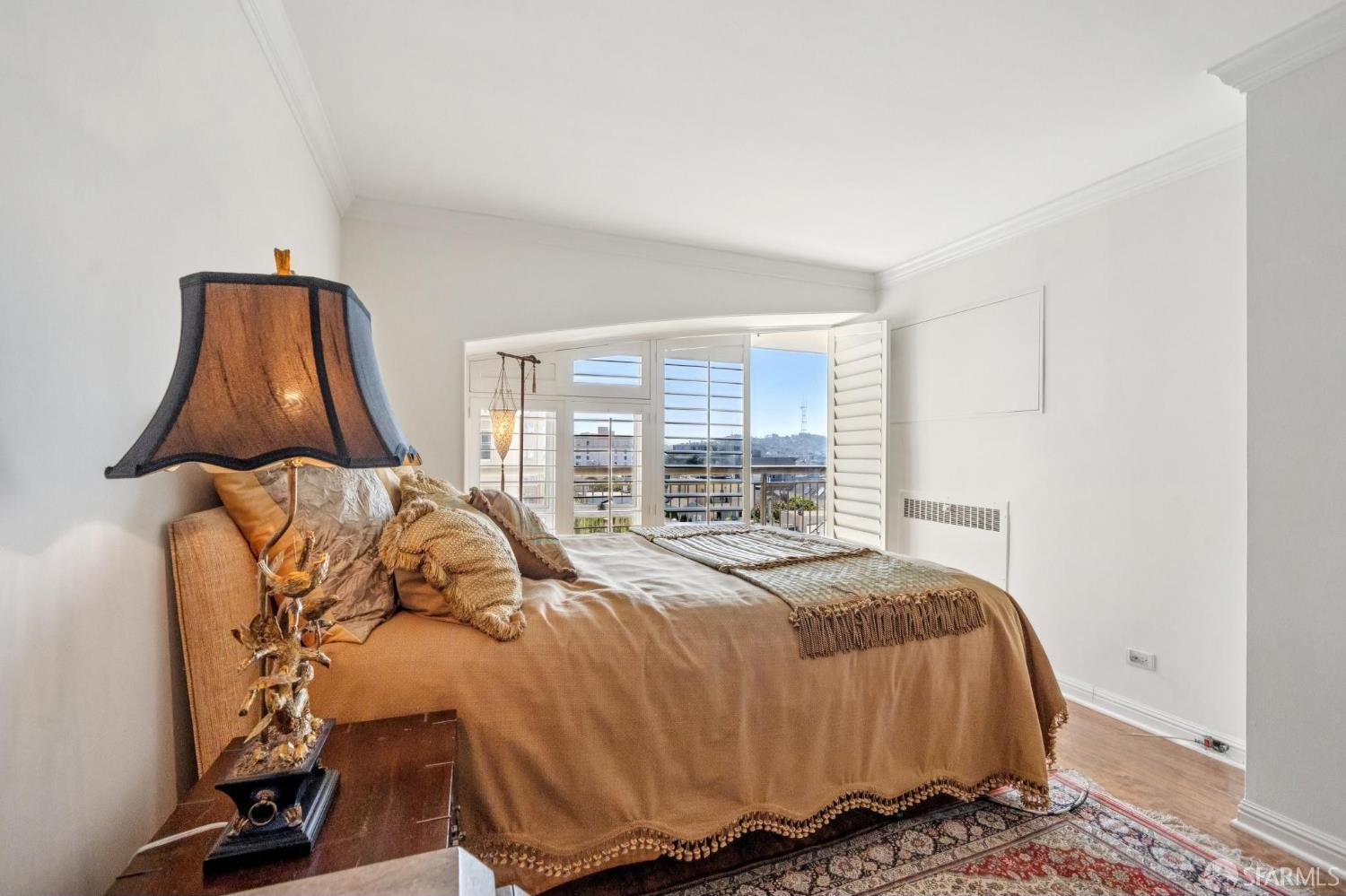 2200 Pacific Avenue, Unit 8E San Francisco, CA 94115 - Photo 12 of 36 a bedroom with a bed and window