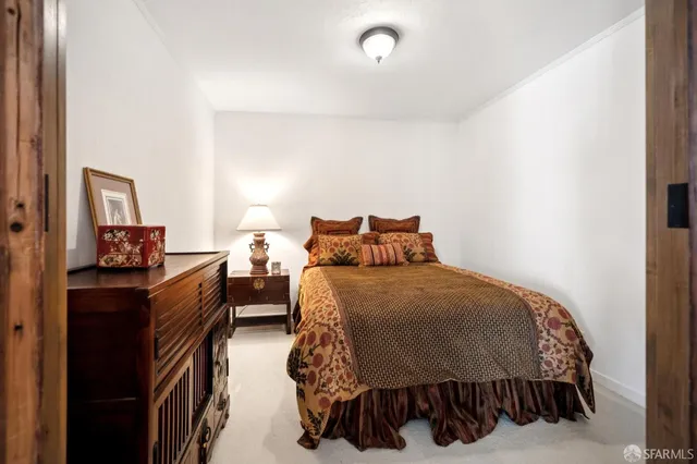 a view of a lake with houses in the back