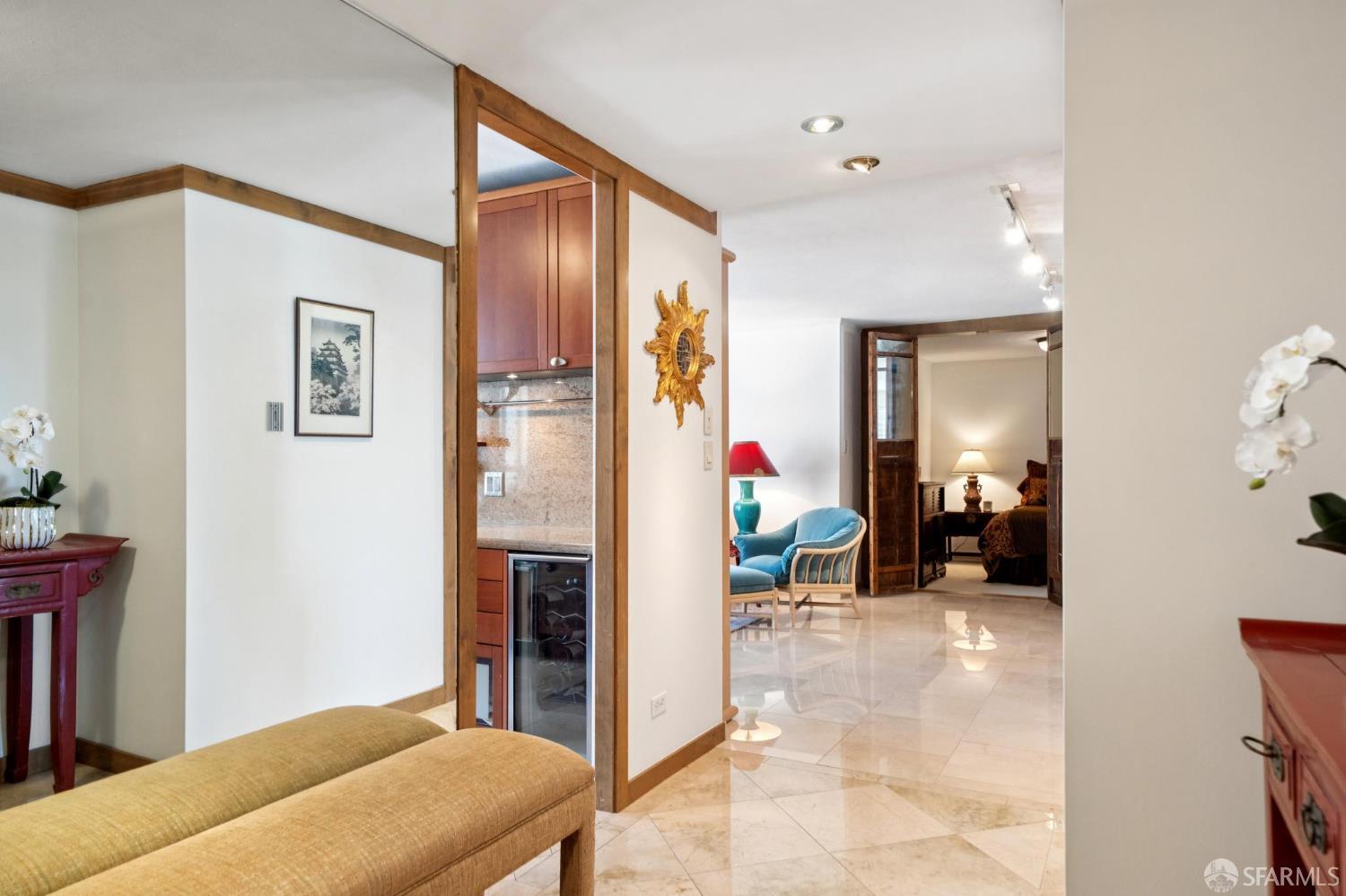 2200 Pacific Avenue, Unit 8E San Francisco, CA 94115 - Photo 17 of 36 a bedroom with a bed and a mirror