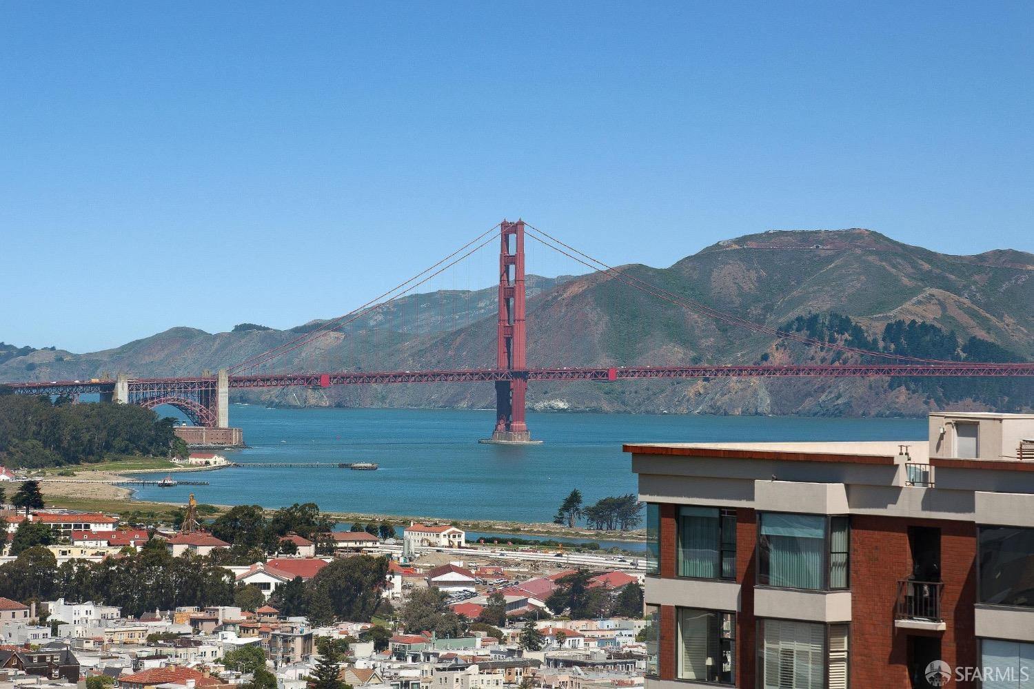 2200 Pacific Avenue, Unit 8E San Francisco, CA 94115 - Photo 29 of 36 a view of a lake with a mountain in the background