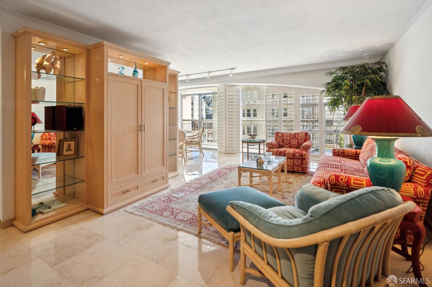 2200 Pacific Avenue, Unit 8E San Francisco, CA 94115 - Photo 5 of 36 a living room with furniture and a window