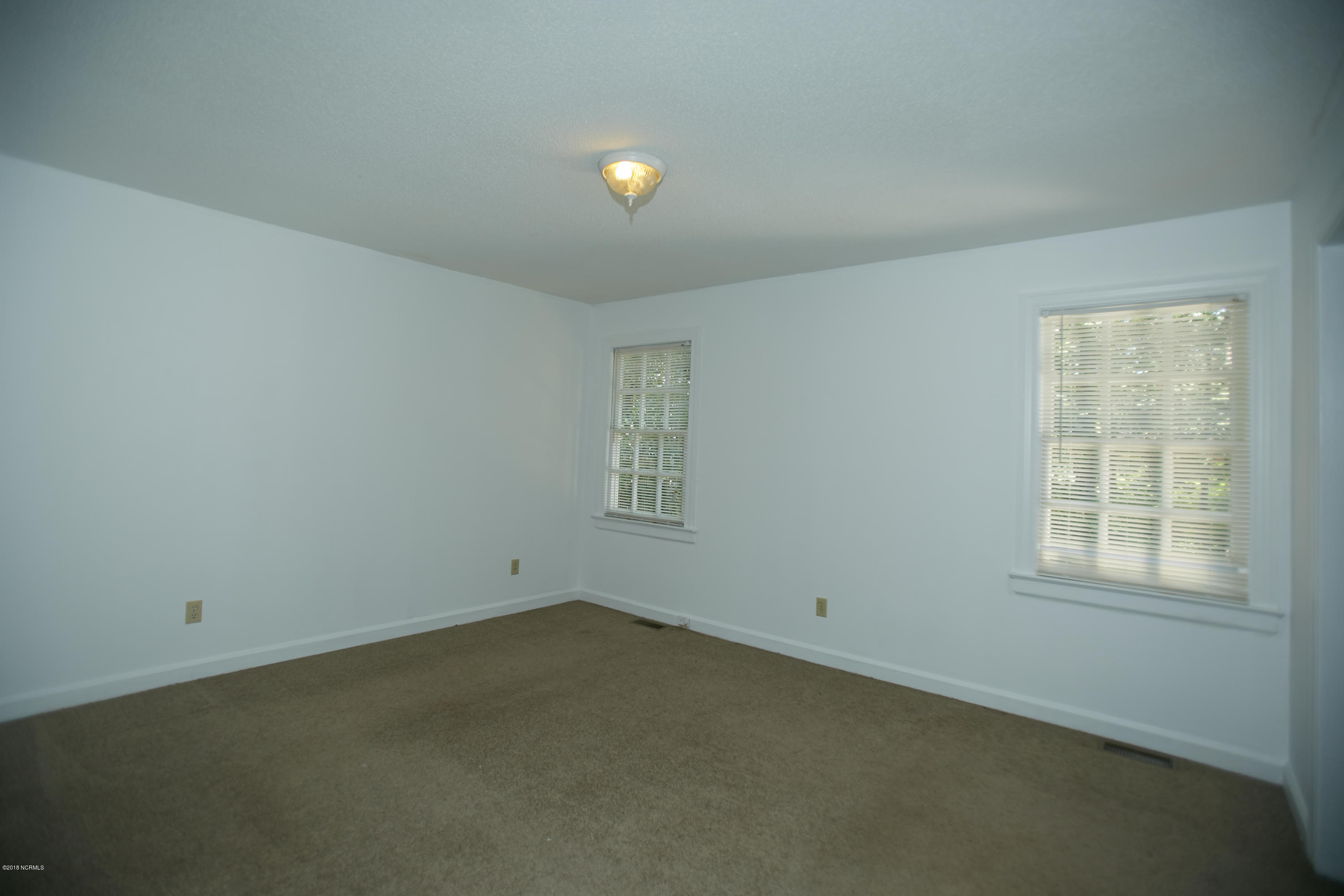 1702 Ridgeway Street West Wilson, NC 27893 - Photo 8 of 17 7 Master Bedroom