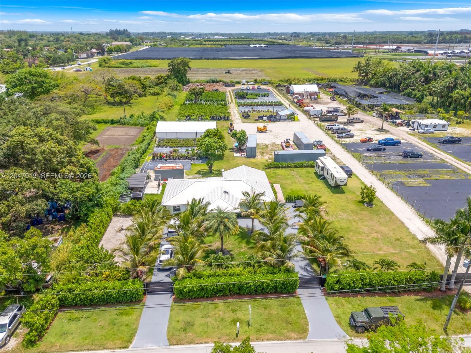 13770 Southwest 192nd Street Miami, FL 33177 - Photo 4 of 27 separate entry's a circle driveway w elect gates and a service entry to rear or 2.75 ac approx. with house and another to adj property