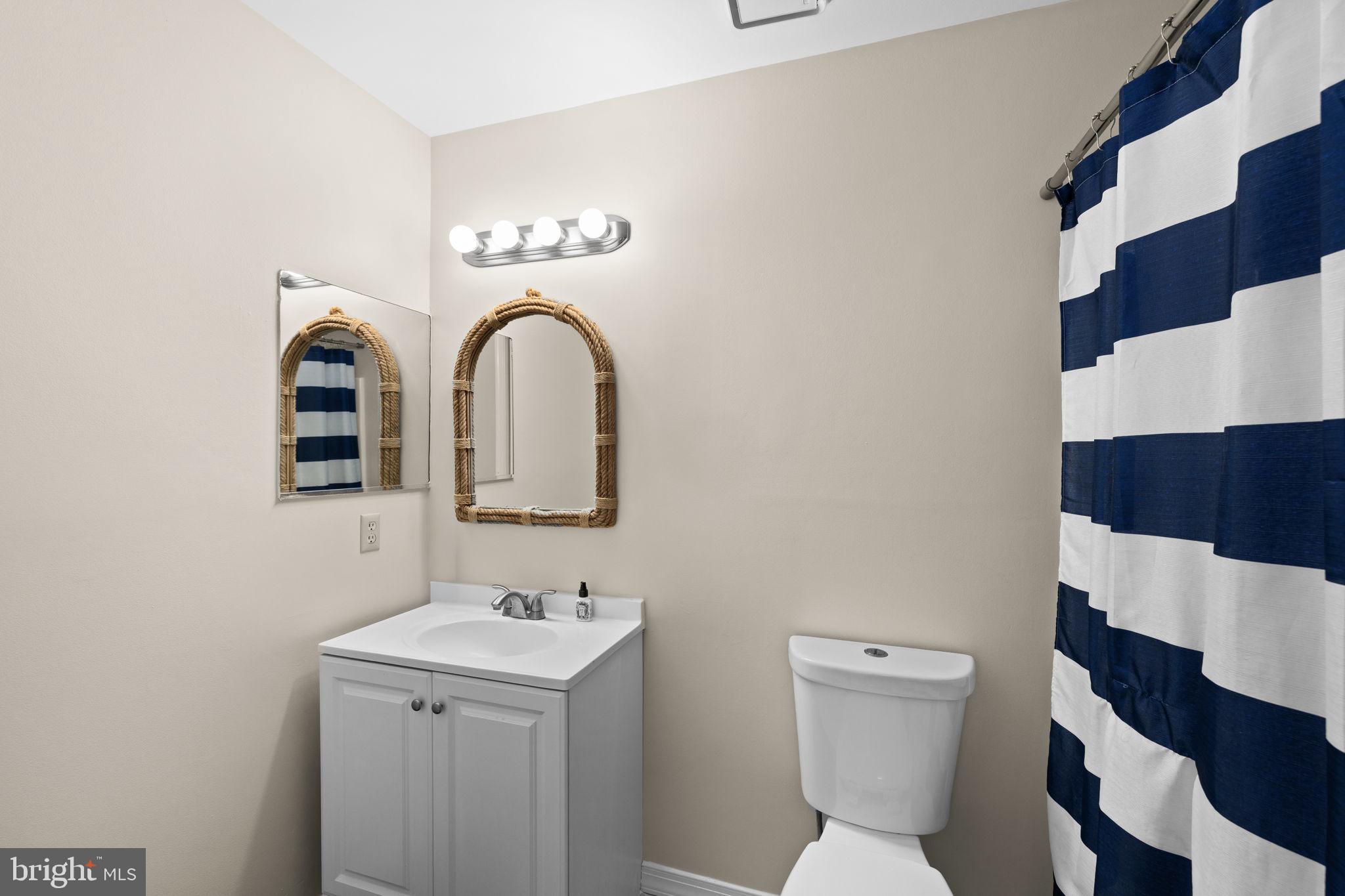 200 Wilderness Lane Locust Grove, VA 22508 - Photo 23 of 67 Chic bathroom with coastal vibes.