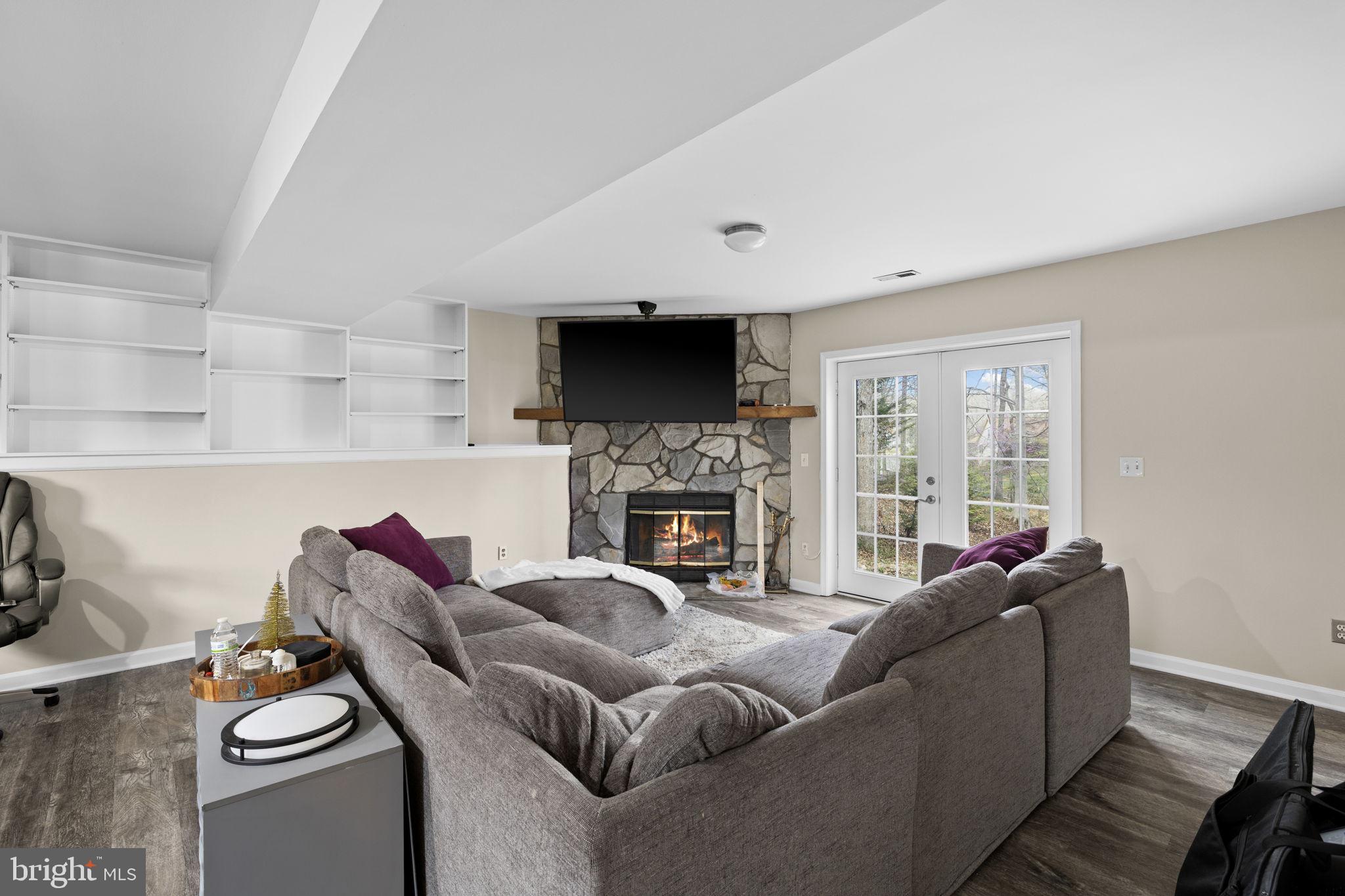 200 Wilderness Lane Locust Grove, VA 22508 - Photo 27 of 67 Cozy living space with stone fireplace.