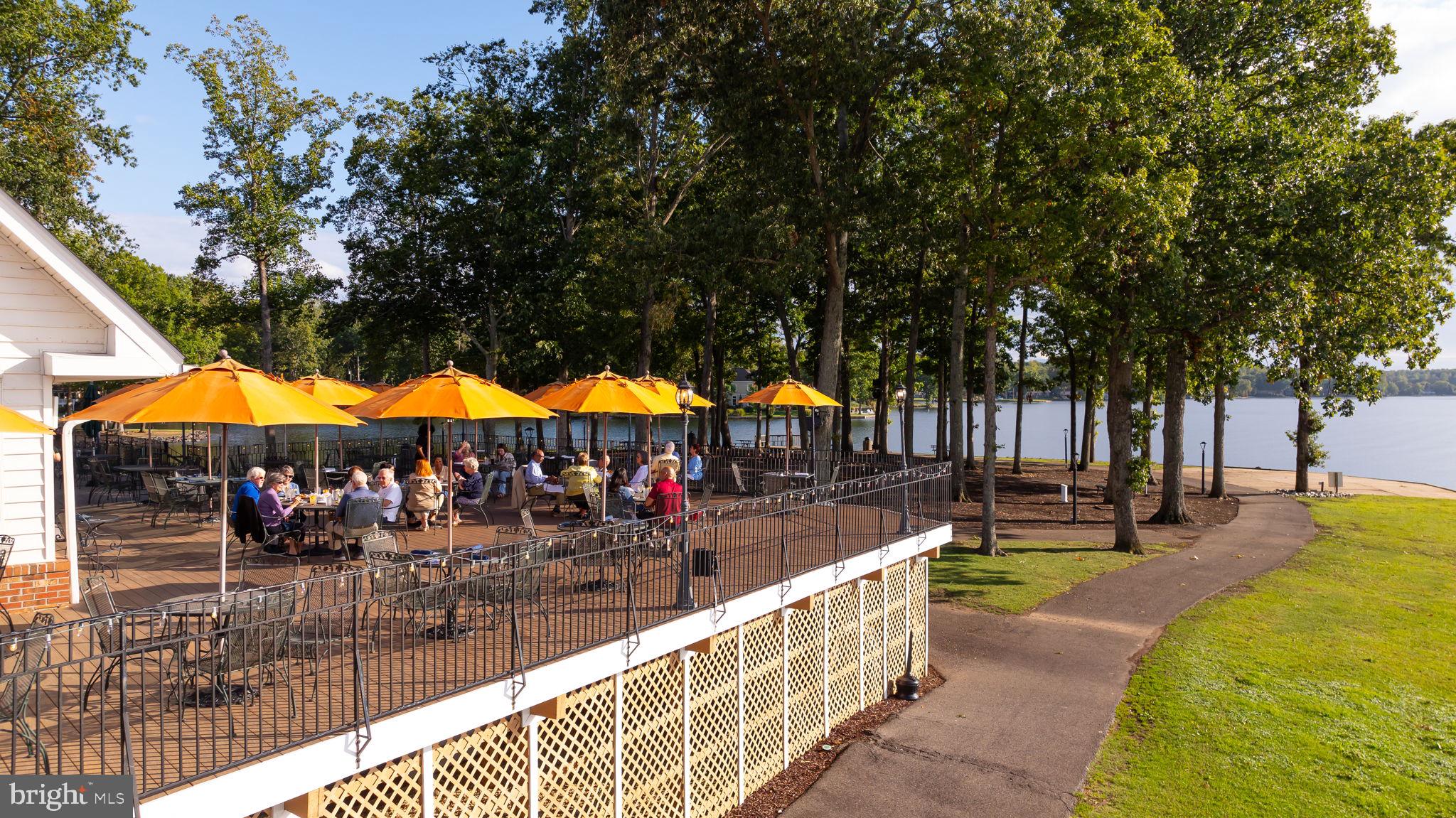 200 Wilderness Lane Locust Grove, VA 22508 - Photo 63 of 67 Lakeside dining under sunny umbrellas.