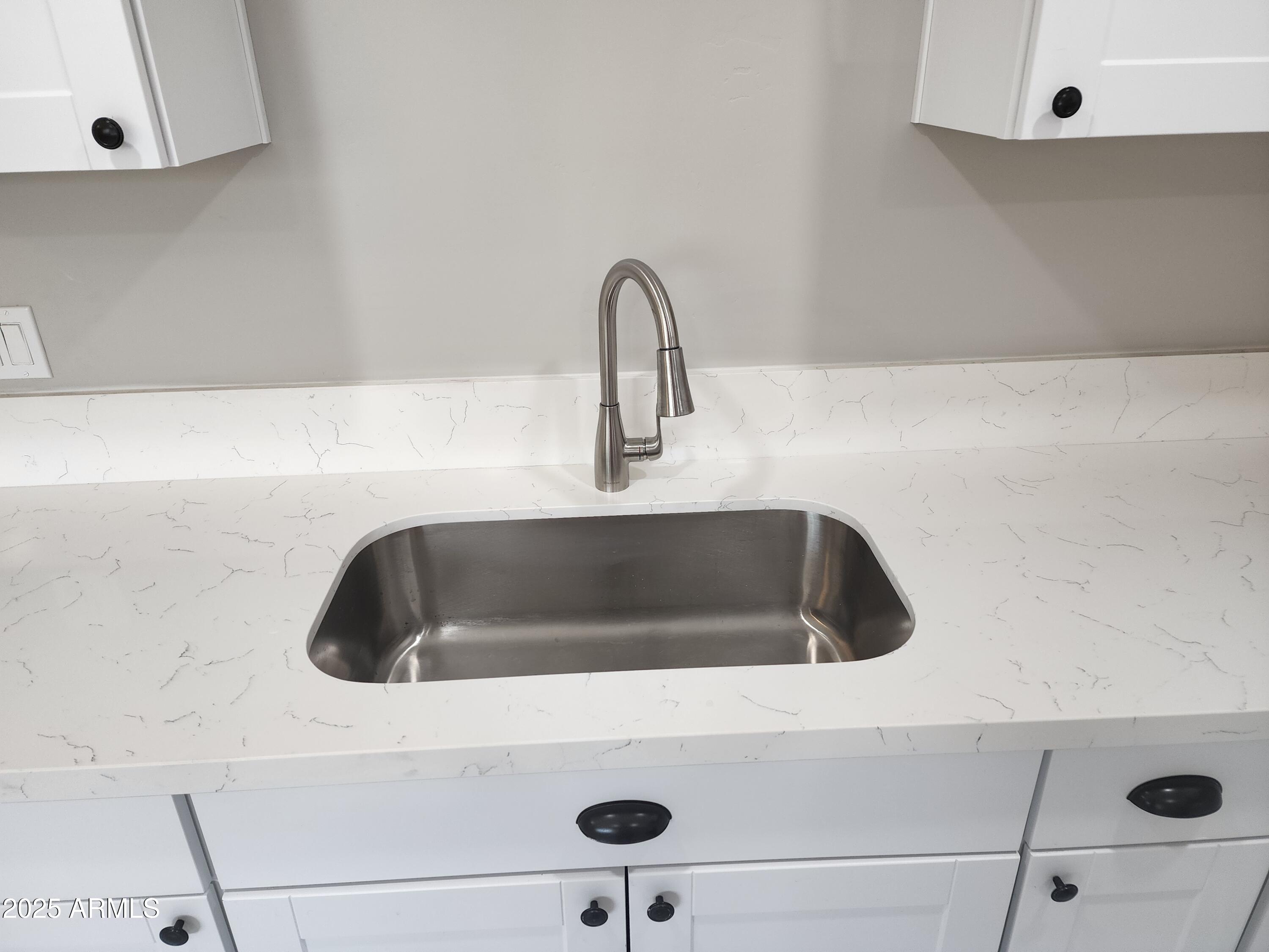 8838 North 2nd Way Phoenix, AZ 85020 - Photo 2 of 16 a close view of sink and tap