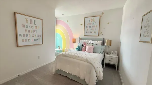 an aerial view of residential houses with yard