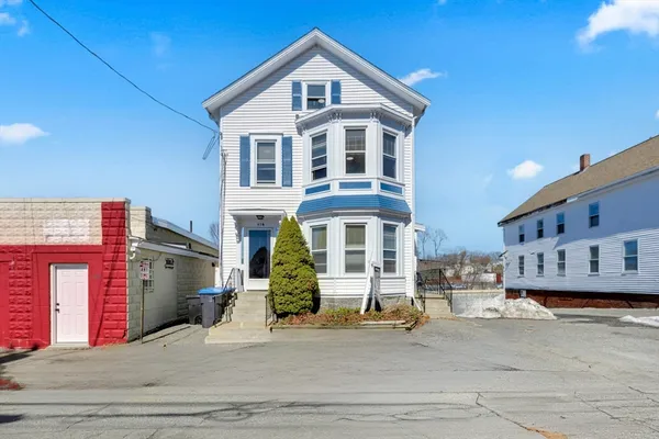 a view of a house with a street