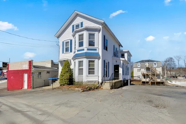 a view of a street with a building