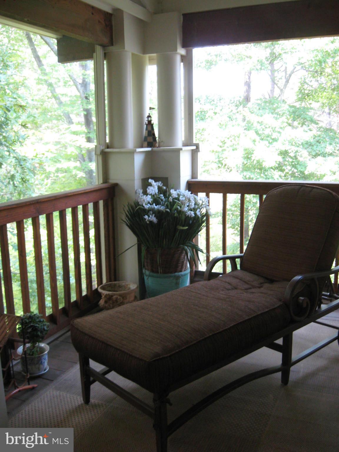 1236 Back Creek Loop, Unit 1236 Solomons, MD 20688 - Photo 11 of 24 a balcony view with a seating space