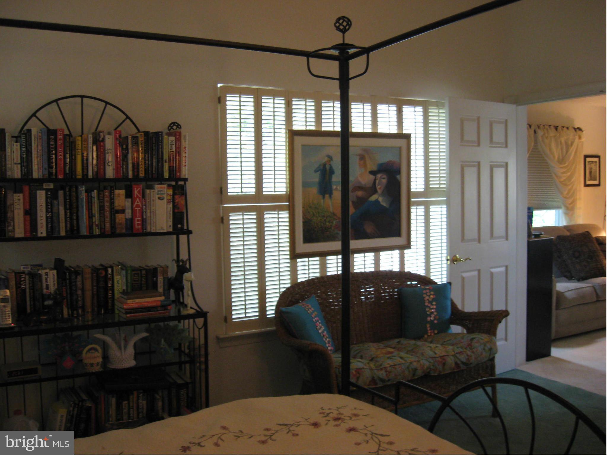 1236 Back Creek Loop, Unit 1236 Solomons, MD 20688 - Photo 13 of 24 a living room with furniture