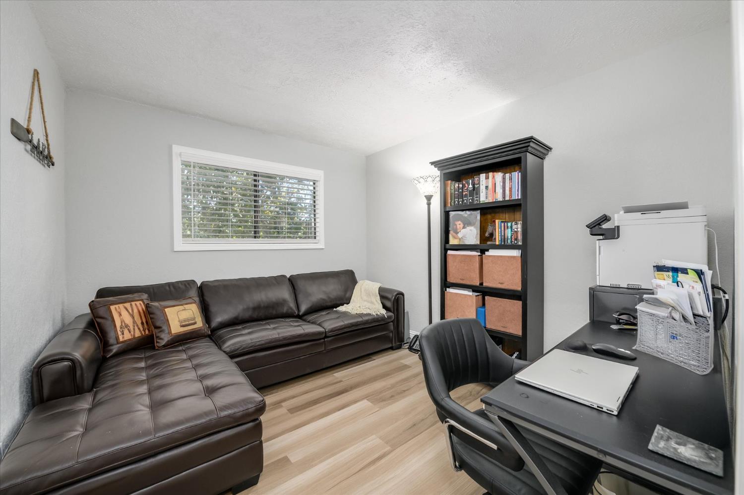 3165 Oakwood Road Cameron Park, CA 95682 - Photo 34 of 55 Bedroom 3 offers flexibility and can easily function as a home office, providing a quiet and functional space for work or study.