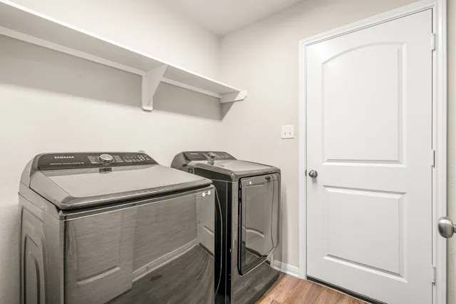 a utility room with dryer and washer