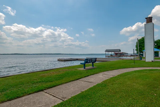 a view of a golf course with a lake